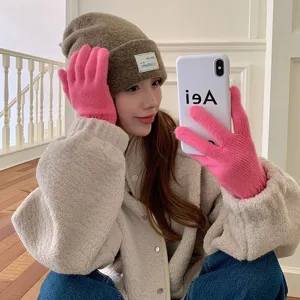 Winter warm knitted beanie hat and cozy gloves set, stylish fleece jacket for women daily wear.