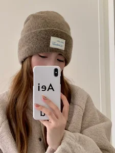 Winter warm wool blend knitted beanie hat for women, thick cozy winter cap with label.