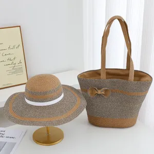Summer women straw sun hat and large capacity beach tote bag set with elegant bow detail.