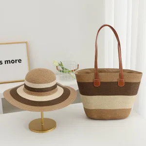 Detailed view of summer straw woven hat and shoulder bag set with stylish stripes for beach.