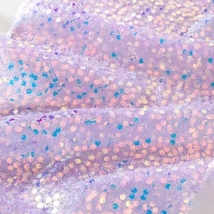 Purple sequin table runner for wedding party birthday hotel banquet decoration and venue setup.