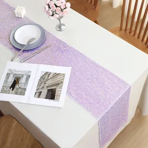 Stunning sequin table runner for wedding party dining table decoration, shiny purple design.