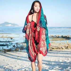 Ethnic boho print cotton linen beach scarf variant showing vibrant colors and stylish fringe details.