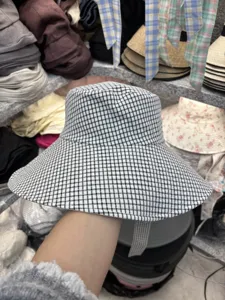 Black and white plaid bucket hat for women, wide brim sun hat with strap, stylish basin hat.
