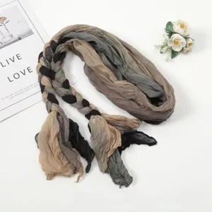 Detailed view of handmade braided gradient scarf, crinkle texture, multi-color accessory.