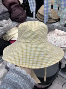 Wide brim yellow plaid bucket hat for women, stylish spring autumn casual sun basin hat.