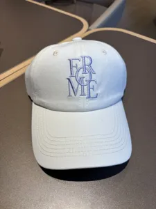 White baseball cap for women and men, casual soft top dad hat with chic letter embroidery.