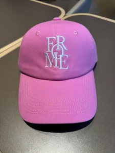 Pink baseball cap for women and men, soft top casual hat with cute letter embroidery details.