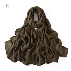 Solid olive green modal cotton hijab scarf for women, soft daily draping detail view.