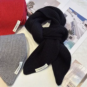 Cozy winter knitted short scarf featuring thick stitches and soft warm material for women.