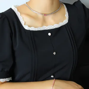 Gold plated stainless steel cubic zirconia tennis necklace and matching bracelet jewelry set.