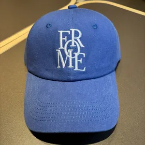 Classic blue embroidered baseball hat for women and men, stylish casual cotton cap.