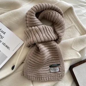 Winter warm knitted scarf for women, cozy wool blend ribbed design, stylish fashion shawl.