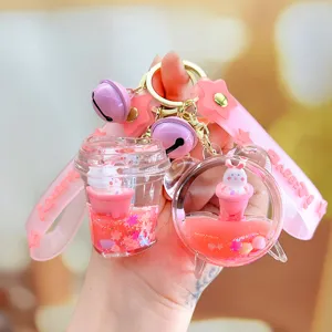 Mignon porte-clés lapin baignoire à huile rose, pendentif de sac à paillettes liquides.