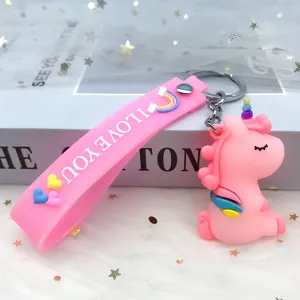 Detailed view of the cute pink unicorn keychain with a rainbow strap, perfect for bags and keys.