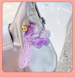 Détail de porte-clés licorne à huile de cerisier, pendentif sac à dos sable mouvant mignon.