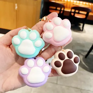 Cute cat paw keychain set, soft silicone cartoon key ring aesthetic bag pendant charms.