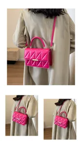 Stylish pink quilted crossbody bag for women, elegant top handle shoulder bag with metal lock.