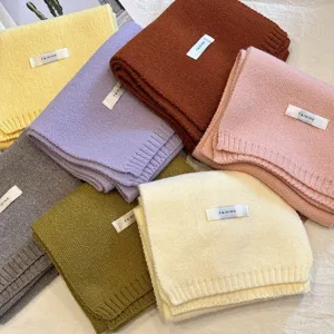 Colorful knitted winter scarf for women, soft cozy wool neck warmer, versatile casual accessory.