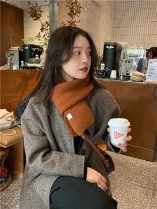 Winter warm solid color knitted scarf detail, soft cozy caramel wool neck warmer for women.