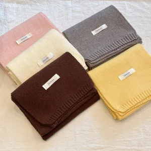Solid color knitted winter scarf, soft warm wool neck wrap for women, stylish daily wear.