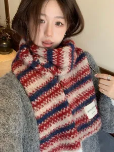 Cozy wool-blend striped knitted winter scarf detail shot, warm autumn and winter fashion accessory.