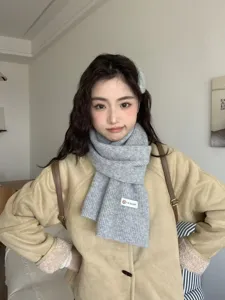Cozy grey knitted scarf for women, soft winter warm neck warmer with chic design detail