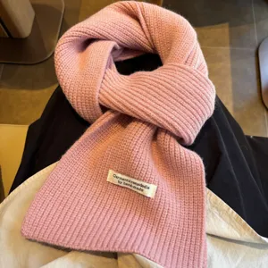 Cozy pink knit scarf for women, thick warm solid color winter neck wrap, soft knitted muffler.