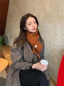 Cozy brown knitted winter scarf for women, solid color soft warm fashion neck warmer.