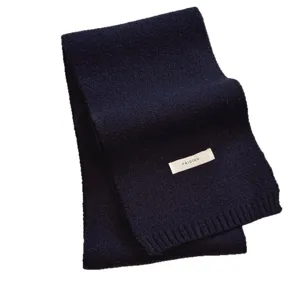 Classic deep blue knitted winter scarf for women, cozy and stylish everyday warm neckwear.