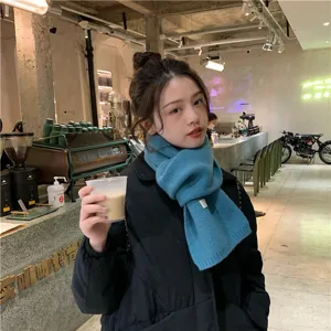 Cozy winter knitted scarf for women, solid color warm neck wrap, stylish daily wear accessory.