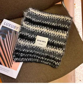 Knitted winter scarf with chic black and white stripes, soft warm cozy winter neck warmer.