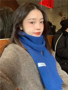 Cozy winter blue knit scarf detail, soft warm casual neck warmer for women and men.