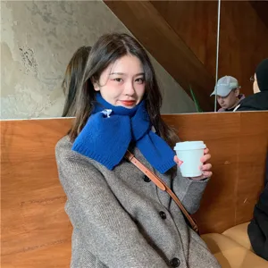 Korean style solid color winter knitted scarf for women, cozy and warm neck wrap accessory.