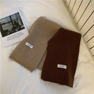 Cozy winter solid color knitted scarf for women and men, warm and soft fashion neck warmer.