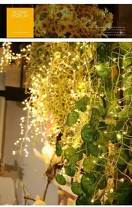 Warm white LED fairy string lights glowing beautifully on green vine plants.