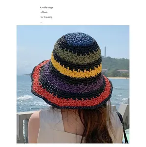 Colorful straw bucket hat detail shot, multi-color striped raffia design for summer beach.