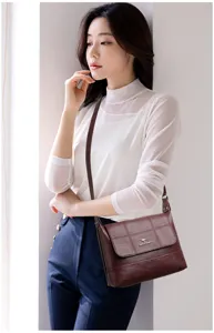 Retro soft leather women crossbody bag with flap and elegant shoulder strap design for daily use.
