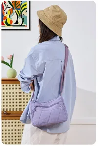 Women washed nylon crossbody bag casual light purple multi-pocket shoulder daily handbag.