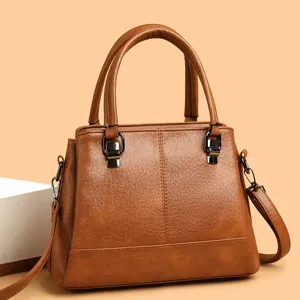 Bruine zachte lederen dames handtas, grote capaciteit stijlvolle shopper en schoudertas.