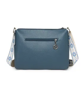 Blue leather crossbody shoulder bag with stylish woven strap and litchi grain texture.