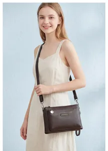 Fashionable multi-compartment PU leather crossbody bag for women, stylish daily shoulder purse.