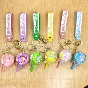 Leuke vloeibare drijfzand lolly sleutelhanger set van 6 kleurrijke ringen voor tassen.