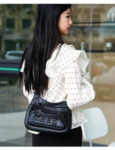 Black soft leather multi-pocket crossbody bag, stylish daily shoulder bag with zipper compartments.
