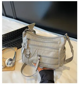 Grijze schoudertas voor dames, retro zacht lederen crossbody tas met meerdere ritsen.