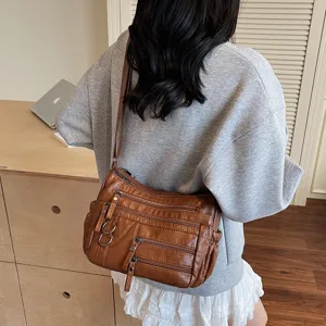 Vrouwen vintage bruine lederen schoudertas multi zakken retro crossbody tas nieuw