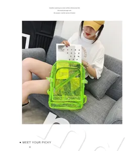 Clear PVC backpack detail showing transparent jelly material and neon green trim.
