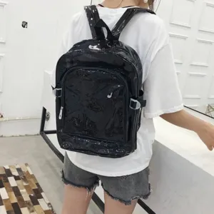 Waterproof black PVC jelly backpack for students, large capacity casual daily school bag.