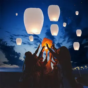 Linternas voladoras blancas ovales ignífugas para deseos, fiestas, festivos y celebraciones.