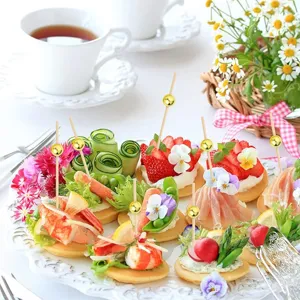 Detailed view of 12cm wooden cocktail fruit picks with gold bead decor for party food presentation.